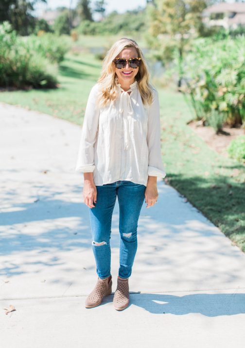 tie neck top, jeans and booties