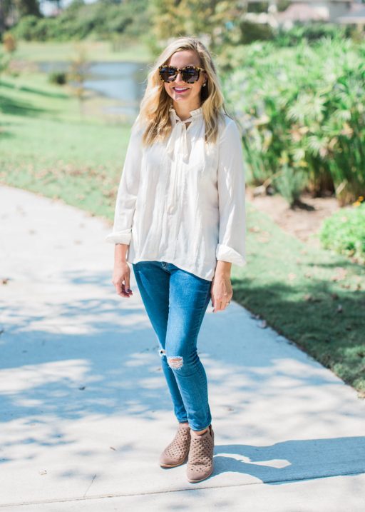 tie neck top, jeans and booties