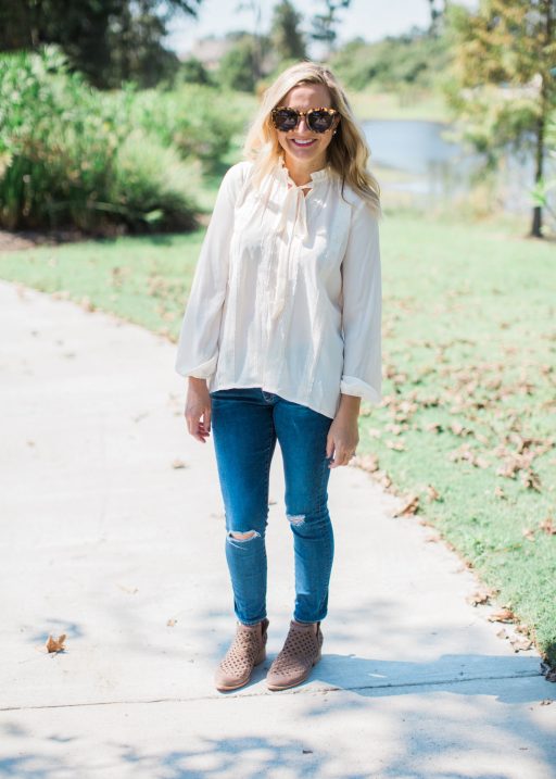 tie neck top, jeans and booties