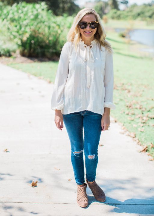 tie neck top, jeans and booties