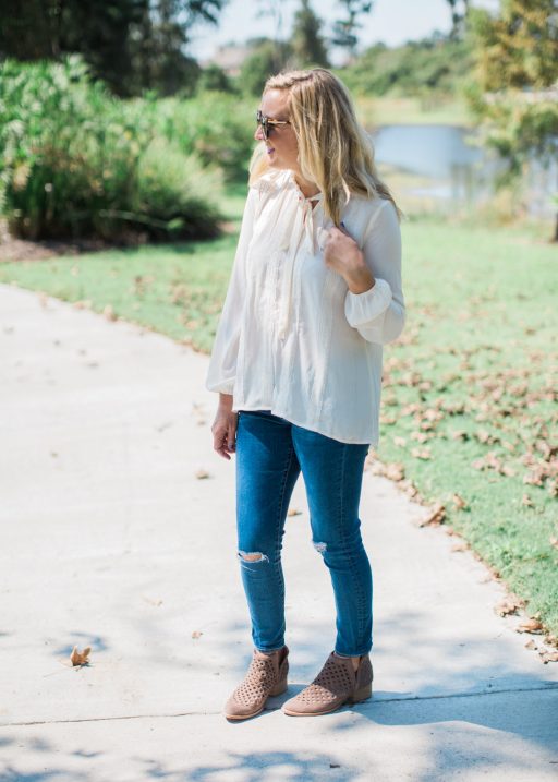 tie neck top, jeans and booties