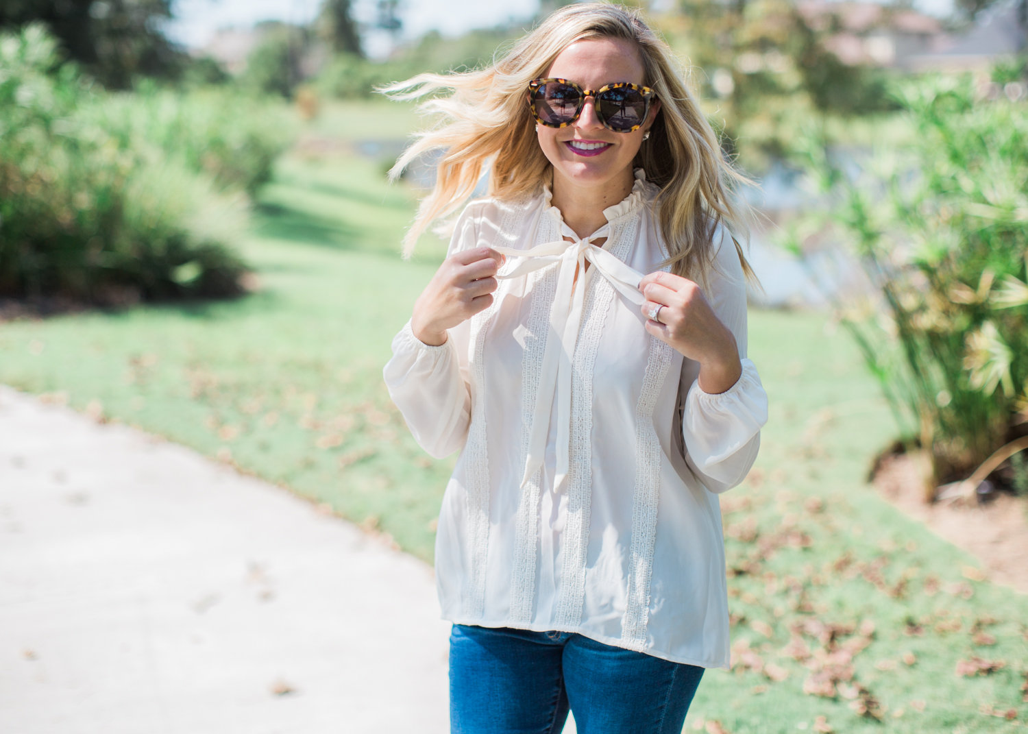 tie neck top, jeans and booties