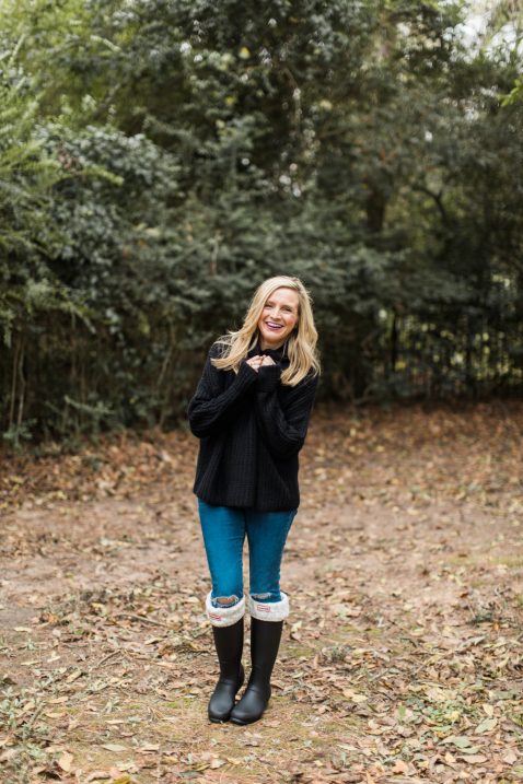 rain boots and turtleneck sweater 