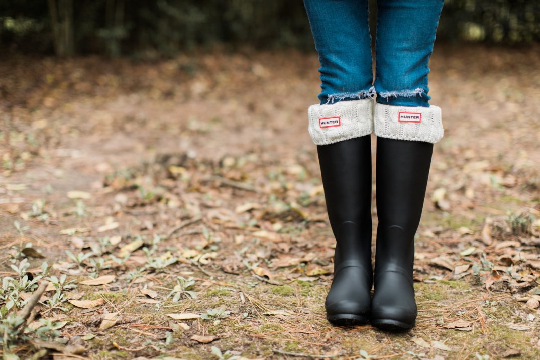 rain boots and turtleneck sweater 