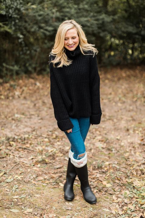 rain boots and turtleneck sweater 