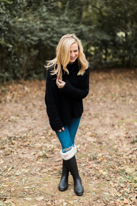 rain boots and turtleneck sweater 