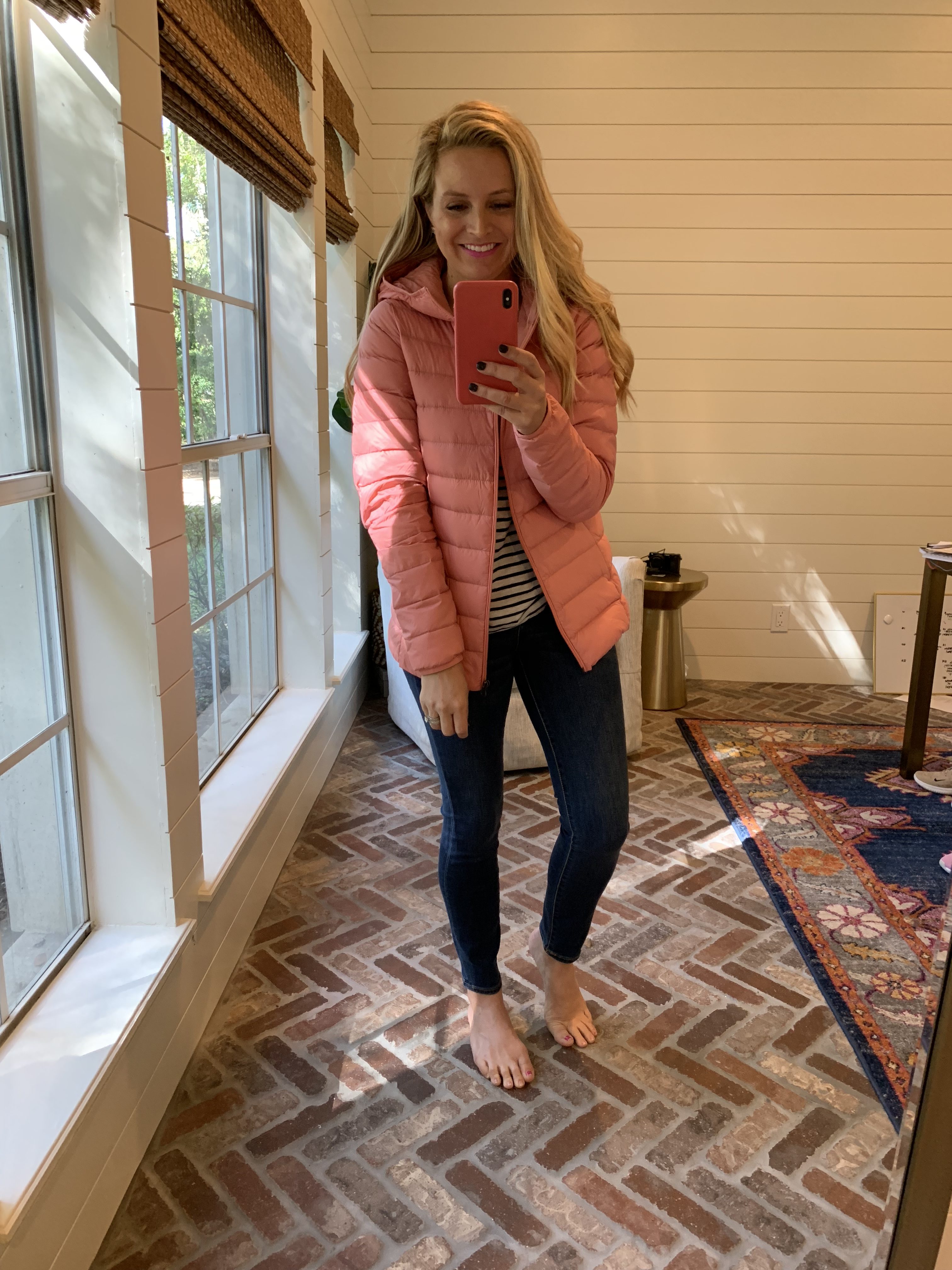 Winter fashion Amazon Favorites featured by top Houston fashion blogger, Fancy Ashley: image of a woman wearing an Amazon Essentials lightweight puffer jacket