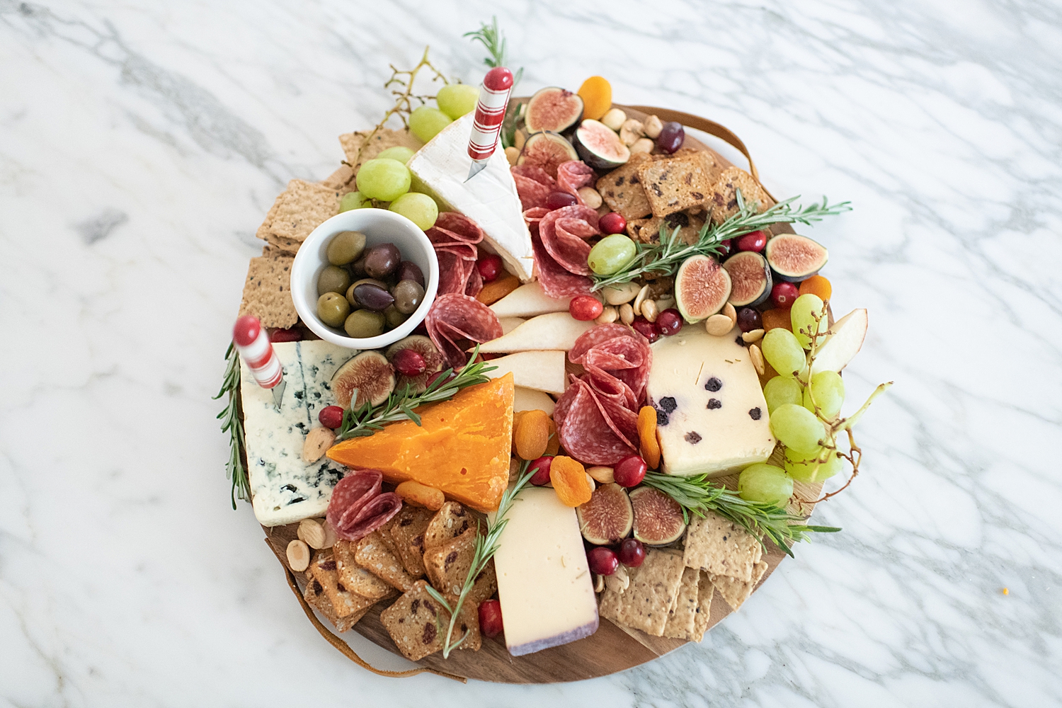 Top Houston life and style blogger, Fancy Ashley, features her tips to prepare the perfect Charcuterie Tray for the Holidays: image of a festive charcuterie tray