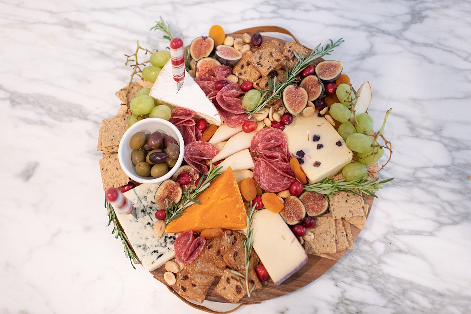 Top Houston life and style blogger, Fancy Ashley, features her tips to prepare the perfect Charcuterie Tray for the Holidays: image of a festive charcuterie tray
