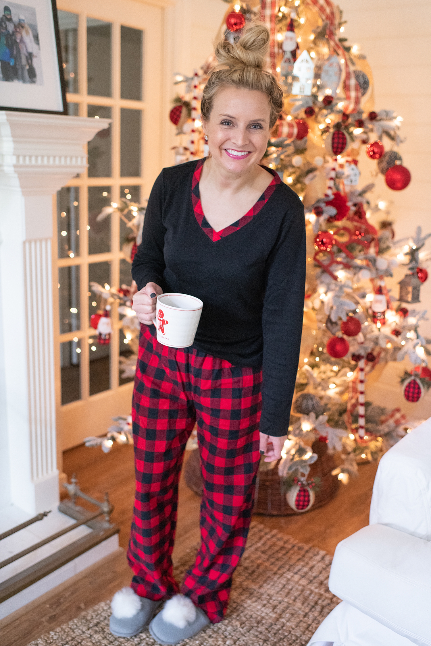 Holiday Pjs & Top Macy's Christmas Gifts featured by top Houston life and style blog, Fancy Ashley" image of a woman wearing Holiday pjs and grey slippers available at Macy's
