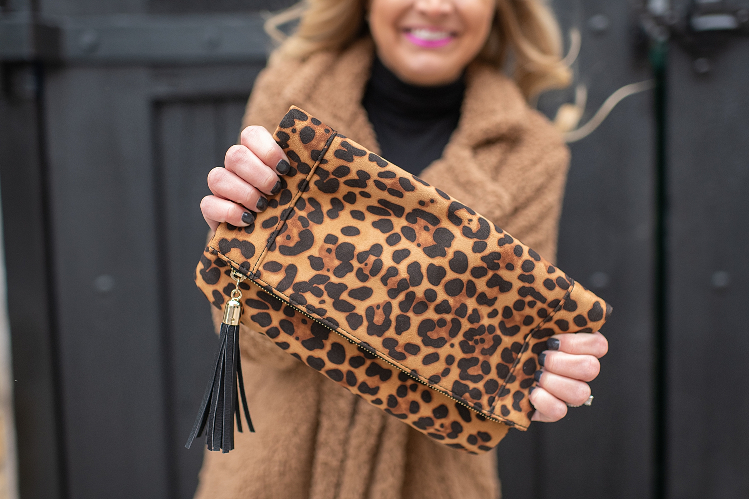 Fashion Accessories Gift Ideas with Sole Society featured by top Houston fashion blogger, Fancy Ashley: image of a woman wearing a Faux fur coat, Sole Society booties, Sole Society leopard clutch, Social Threads faux leather leggings and Social Threads black turtleneck