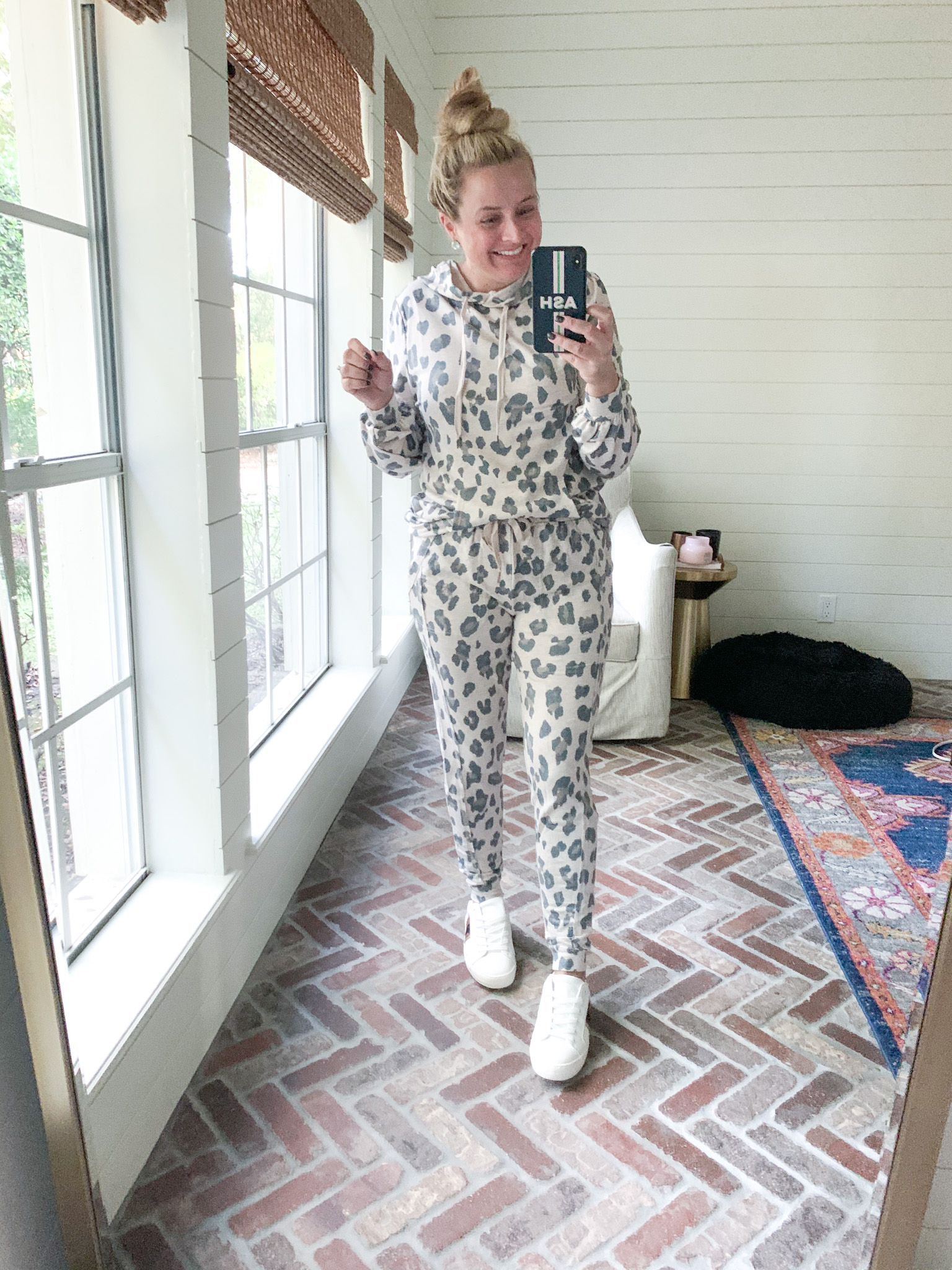 Fall Clothing by popular Houston fashion blog, Fancy Ashley: image of a woman wearing a Walmart Scoop Women's Animal Printed Joggers with Front Seaming, Walmart Scoop Women's Leopard Print French Terry Hoodie, and a pair of Walmart Time and Tru Women’s Fashion Sneakers.