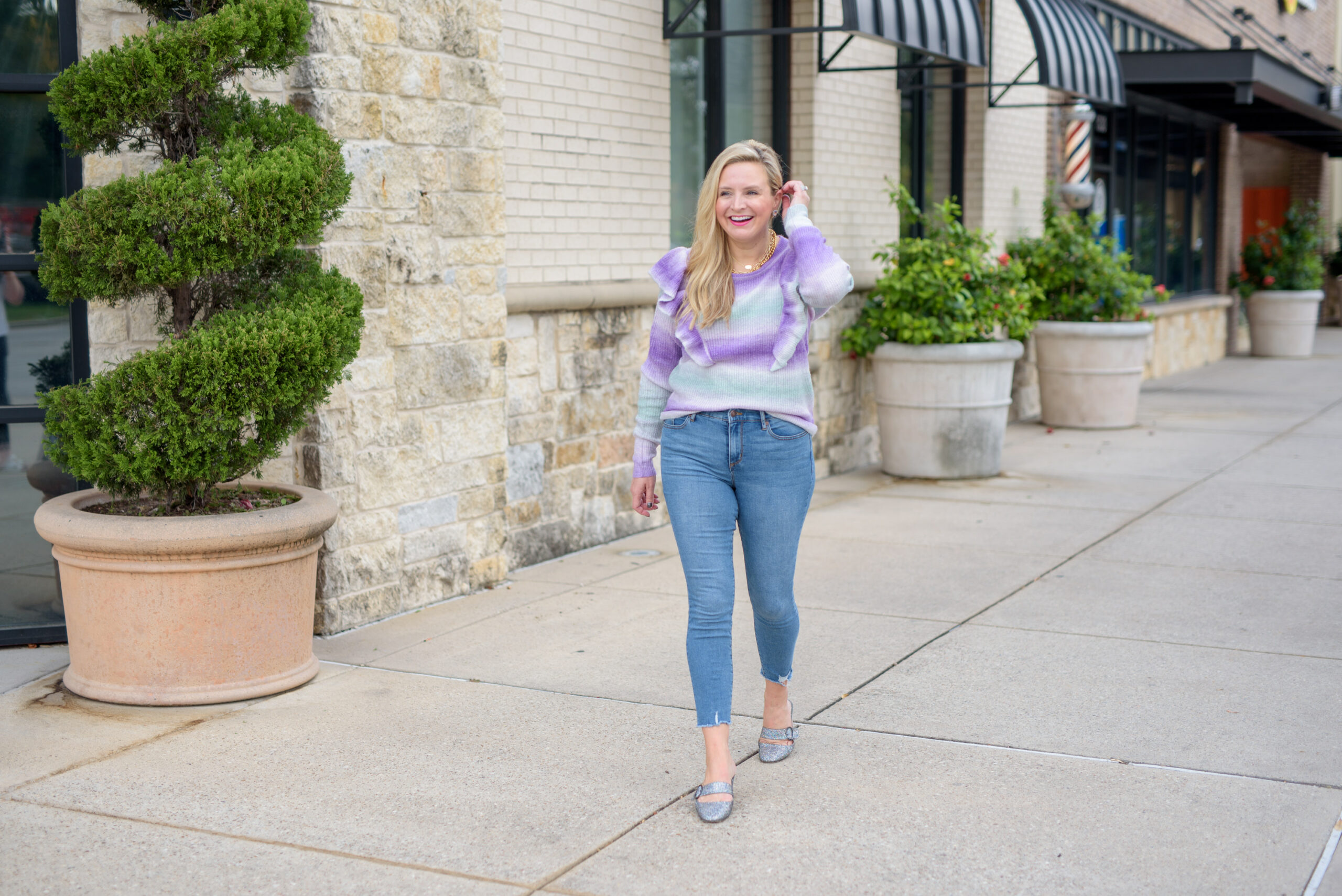 Walmart Womens Clothes by popular Houston fashion blog, Fancy Ashley: image of a woman wearing a Walmart Scoop Women's Space Dye Sweater with Ruffle Trim and Walmart No Boundaries Juniors' Mom Jeans.