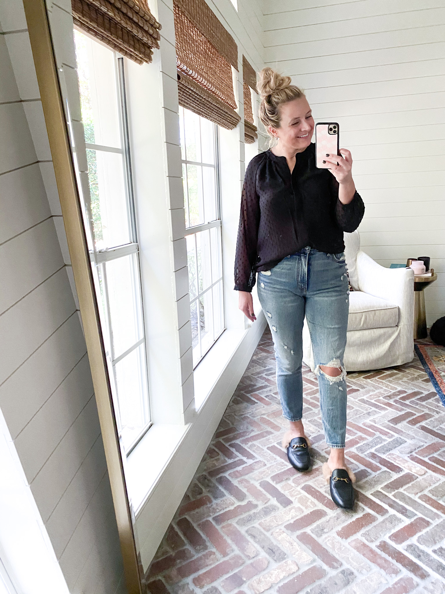 Gibson Look by popular Houston fashion blog, Fancy Ashley: image of a woman wearing a Gibson Look button front blouse, Abercrombie and Fitch distressed jeans, and faux fur lined mules. 