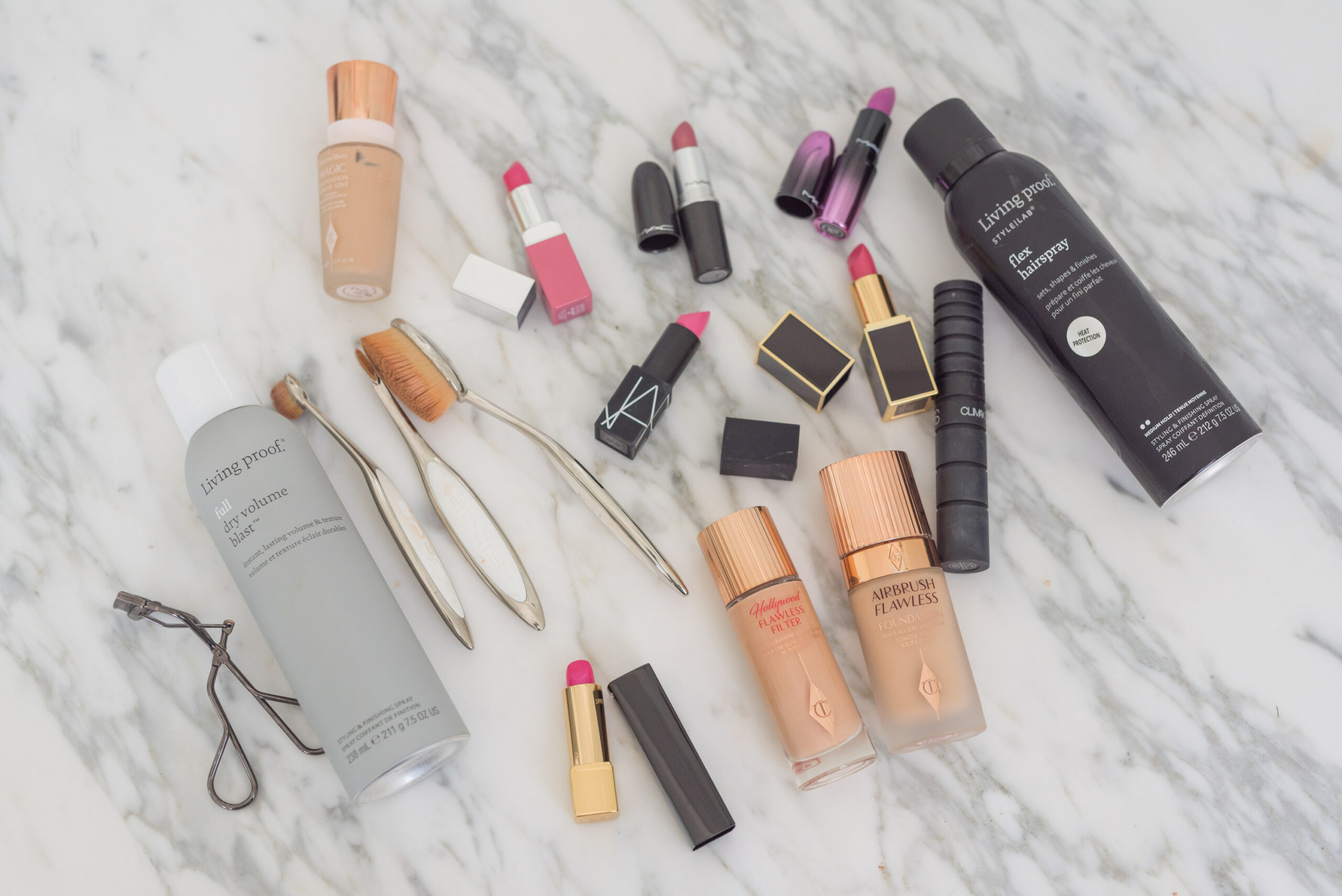 Sephora Springs Savings Event by popular Houston beauty blog, The House of Fancy: image of Living Proof dry volume blast spray, foundation brushes, foundation, lipstick, eyelash curler, mascara, and Living Proof flex spray. 