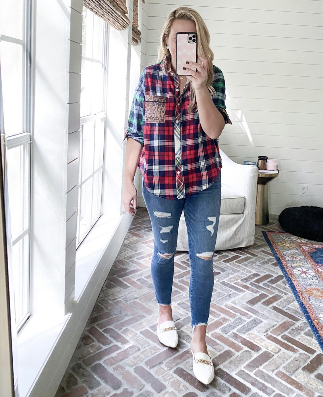 November Outfits by popular Houston fashion blog, Fancy Ashley: image of a woman wearing a plaid button up, distressed denim and white loafers. 