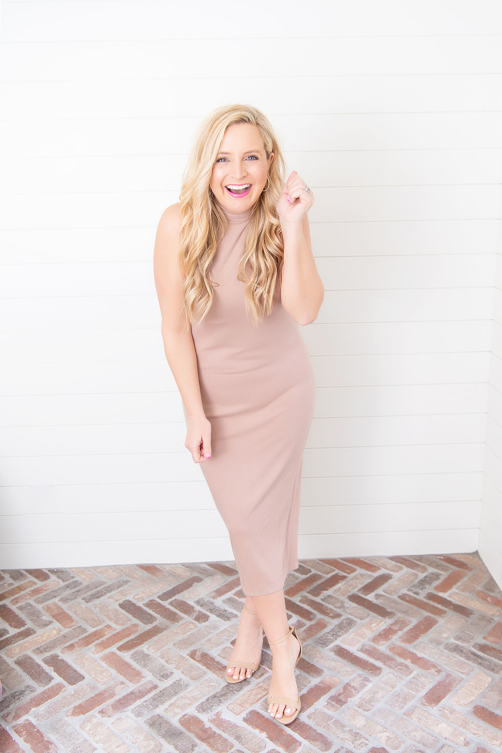 International Women's Day with Gibson by popular Houston fashion blog, Fancy Ashley: image of a woman wearing a Gibson mock neck sleeveless body-con dress. 
