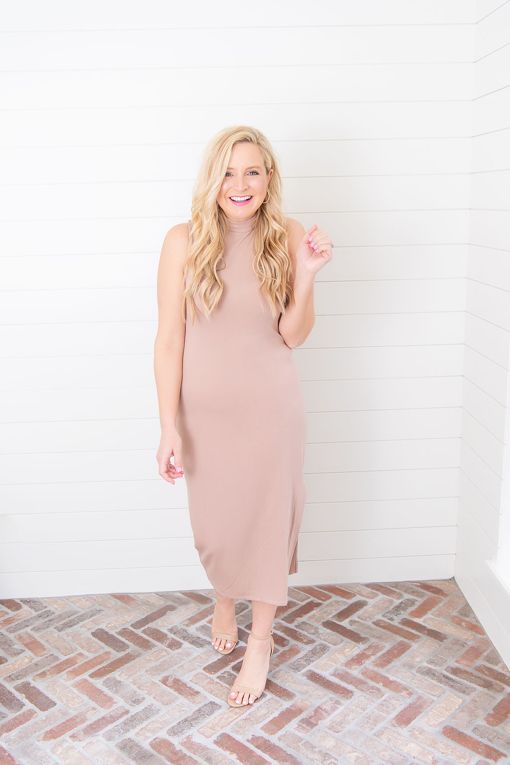 International Women's Day with Gibson by popular Houston fashion blog, Fancy Ashley: image of a woman wearing a Gibson mock neck sleeveless body-con dress. 