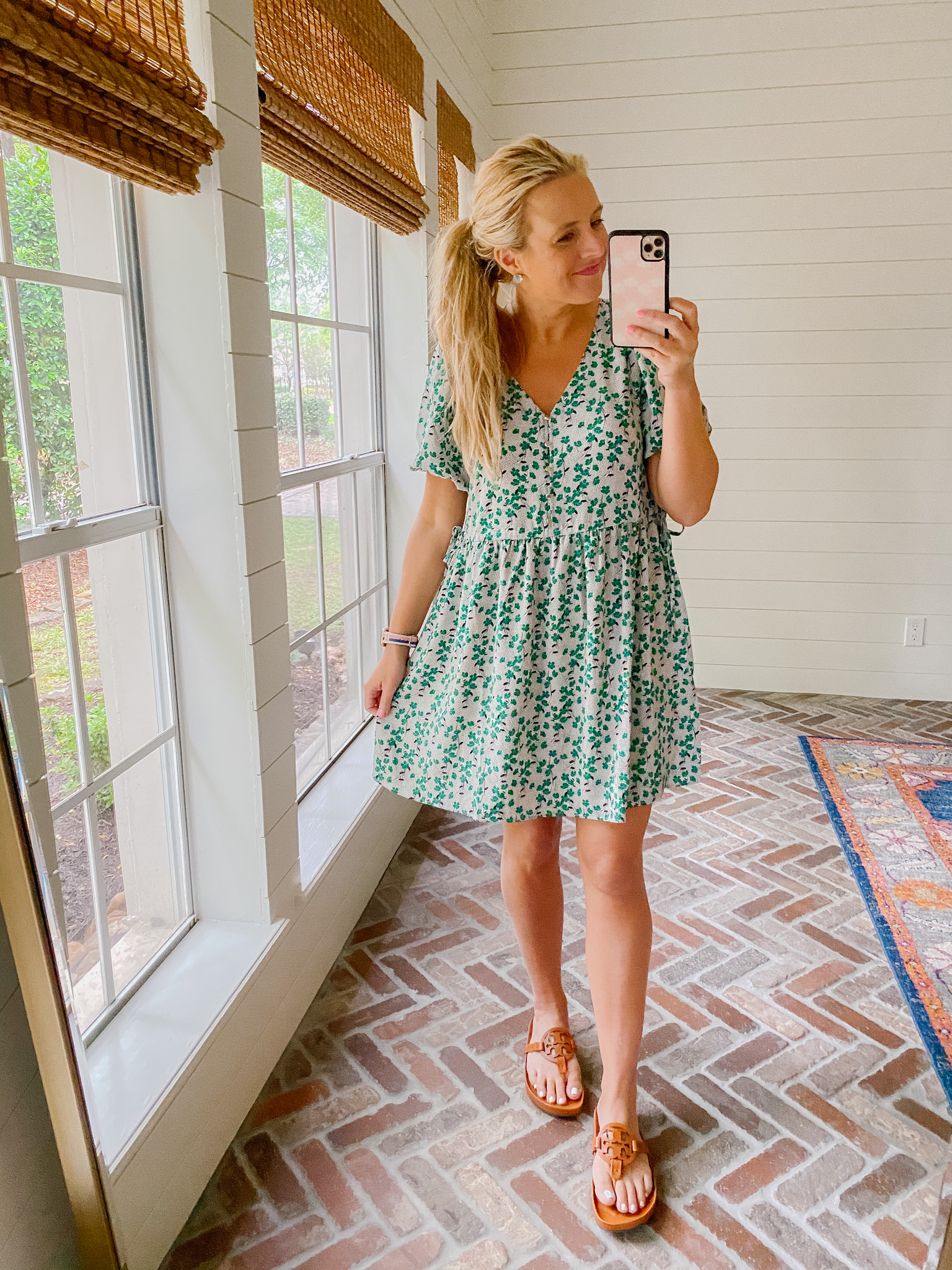 Loft Clothing by popular Houston fashion blog, The House of Fancy: image of a woman wearing a Loft green and white floral print dress with brown Tory Burch slide sandals. 