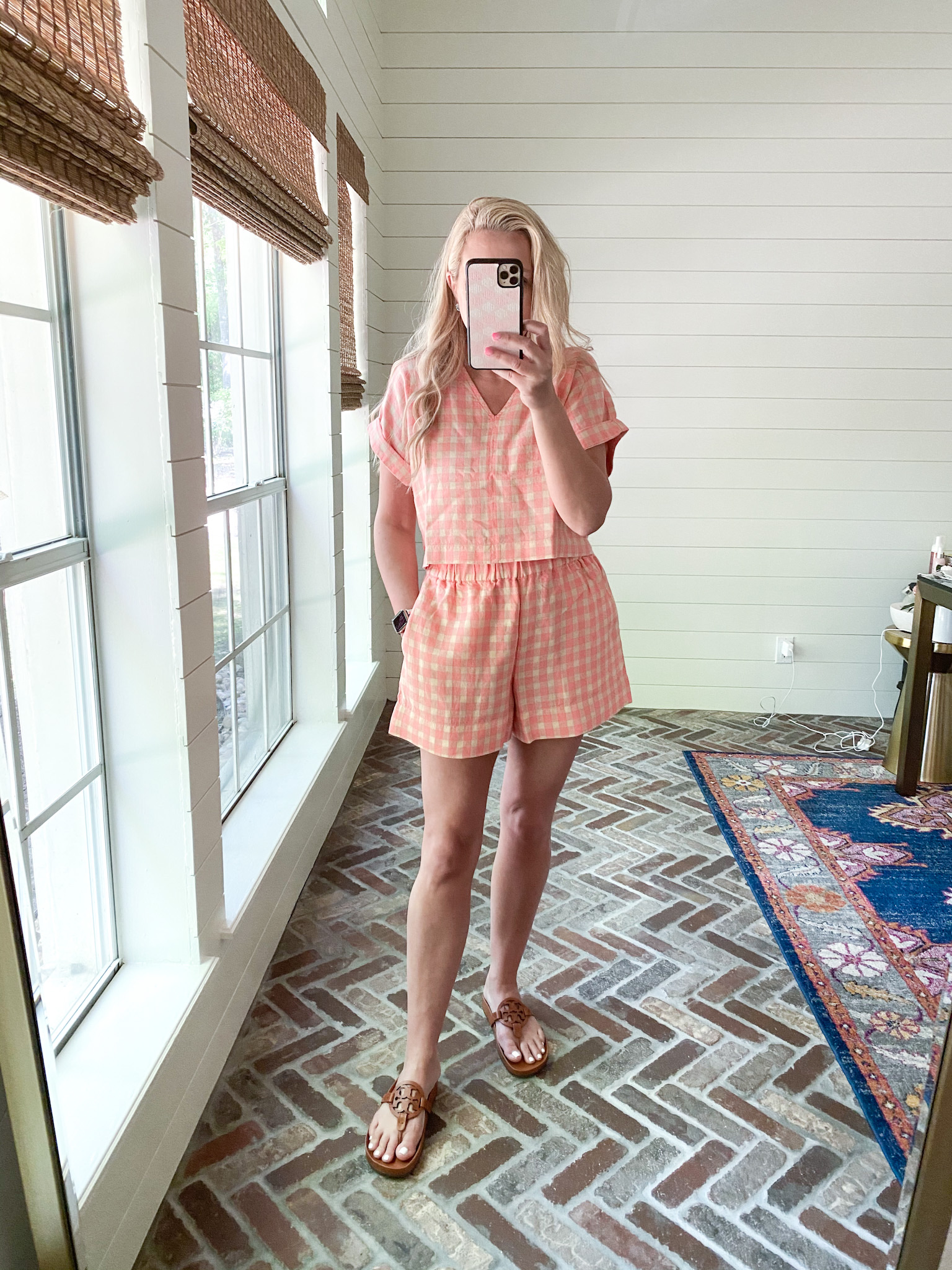 Loft Clothing by popular Houston fashion blog, The House of Fancy: image of a woman wearing a Loft pink and cream gingham shirt and short set with brown Tory Burch slide sandals. 