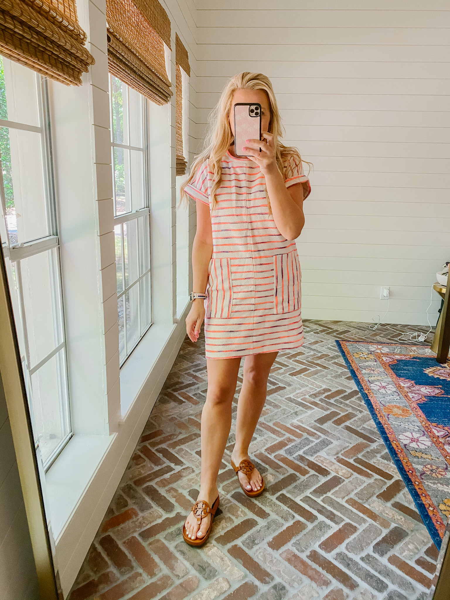 Loft Clothing by popular Houston fashion blog, The House of Fancy: image of a woman wearing a Loft stripe dress with pockets and brown Tory Burch slide sandals. 