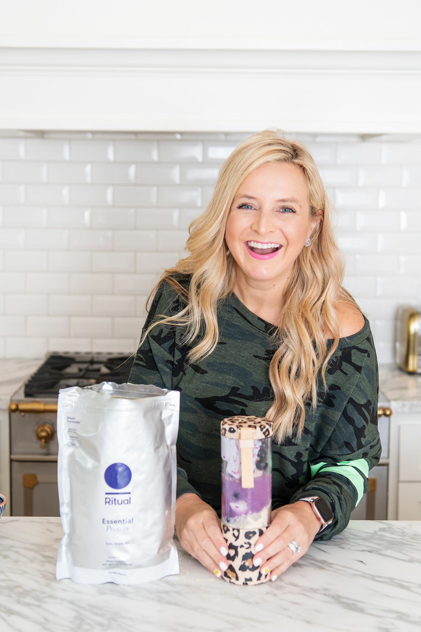 Healthy Living by popular Houston lifestyle blog, The House of Fancy: image of a woman wearing a camo top and putting ritual powder in a leopard print cup. 