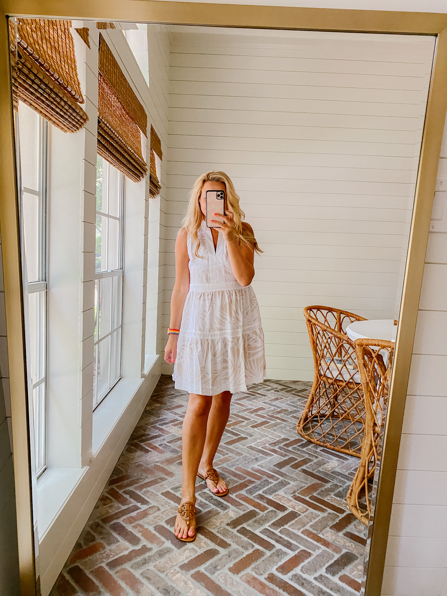 Summer Clothing from Gibson Look by popular Houston fashion blog, The House of Fancy: image of a woman wearing a white tropical print dress with a pair of brown Tory Burch sandals. 