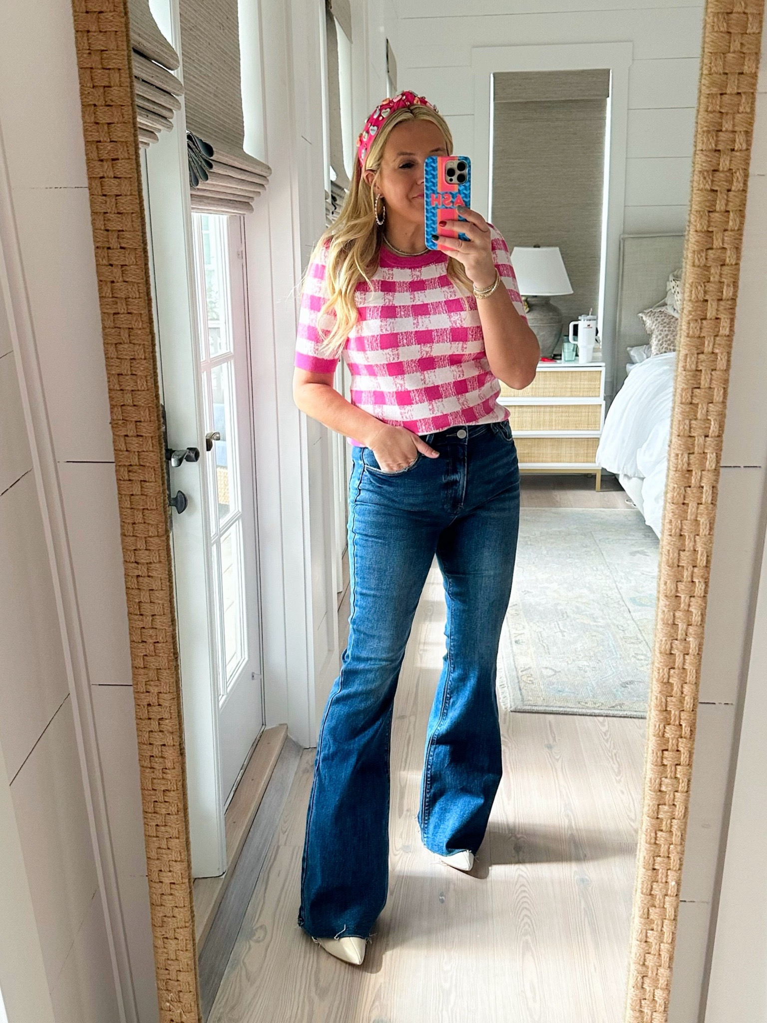 Pink top and jeans