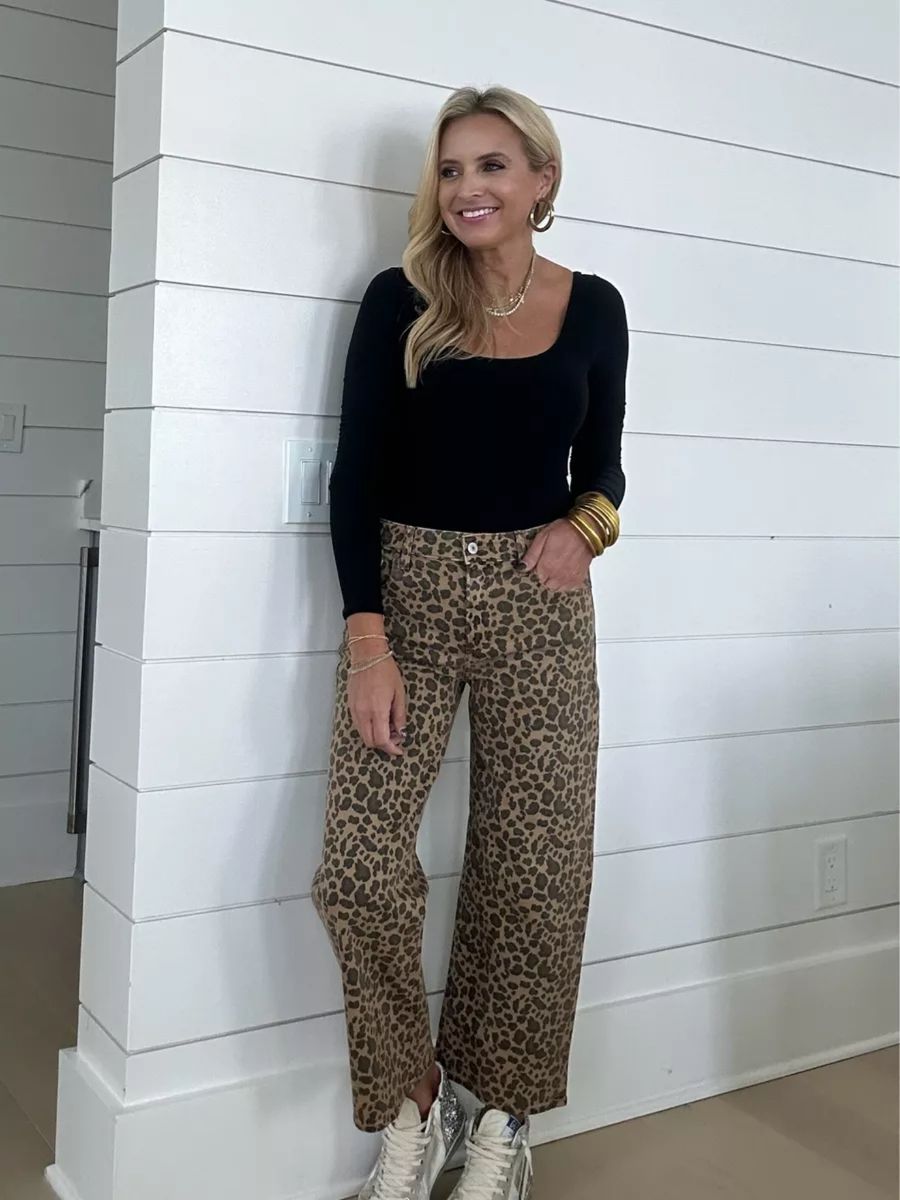 Bodysuit, leopard jeans, and sneakers